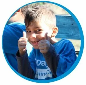 preschool thumbs up happy child