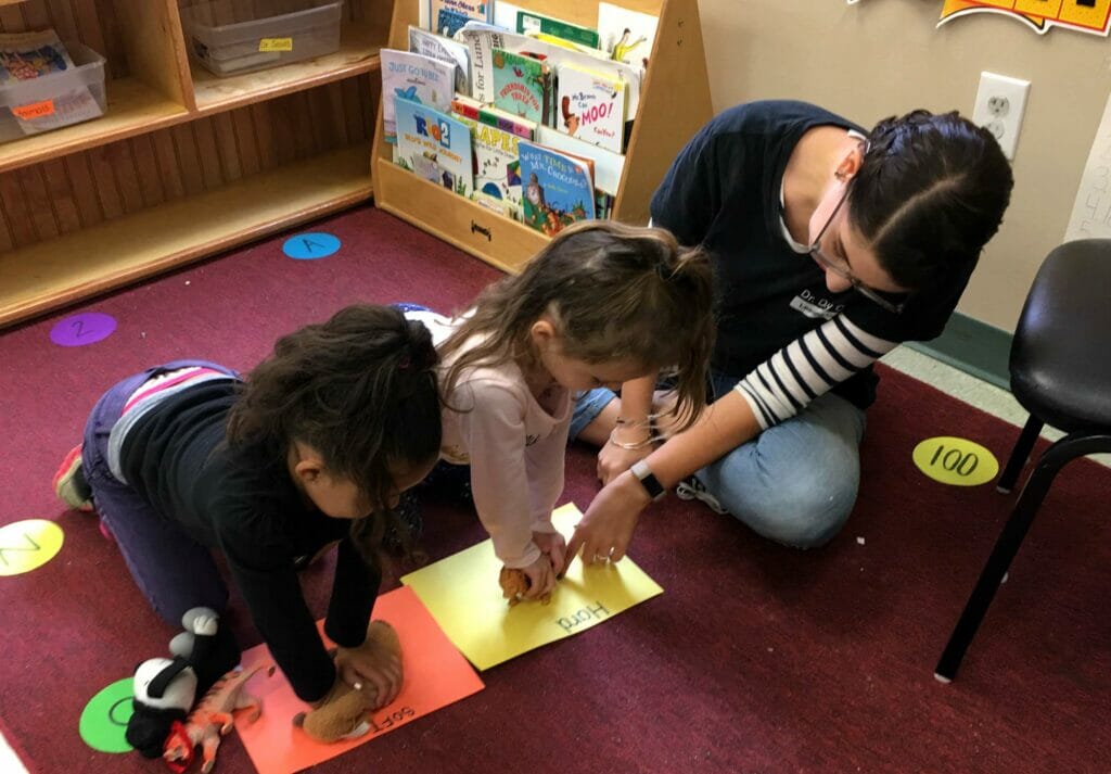 Teacher and children