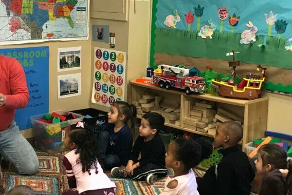 Representative Tobon reads to DDC Pawtucket Concord St. children