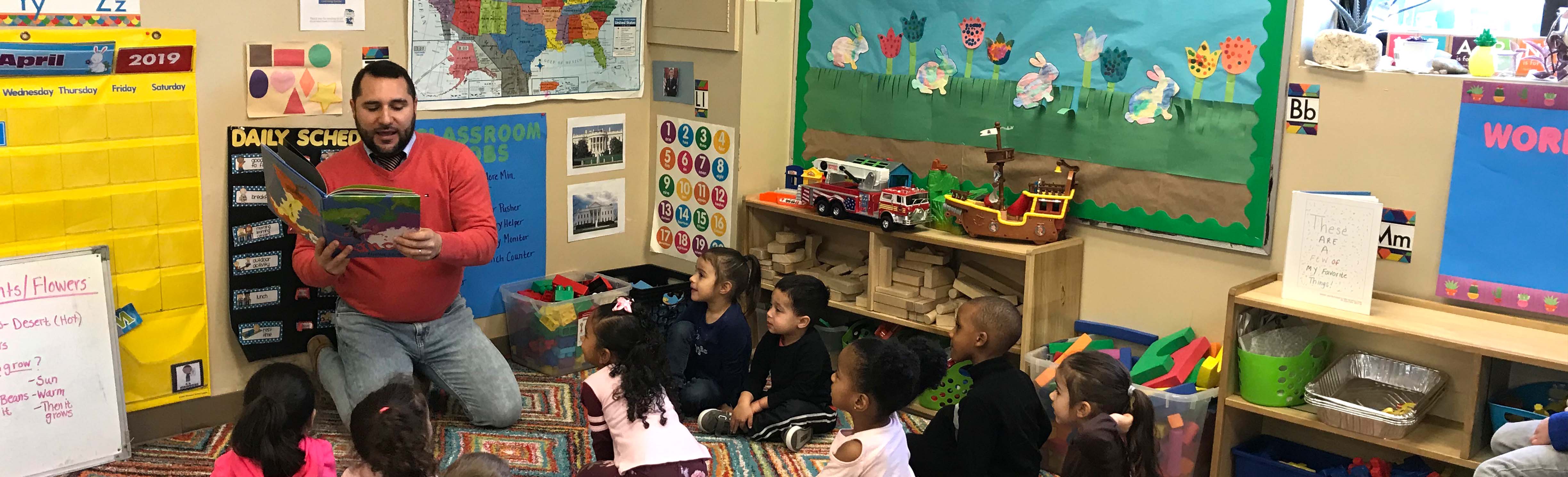 Representative Tobon reads to DDC Pawtucket Concord St. children