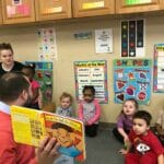 Representative Tobon reads to DDC Pawtucket Concord St. children