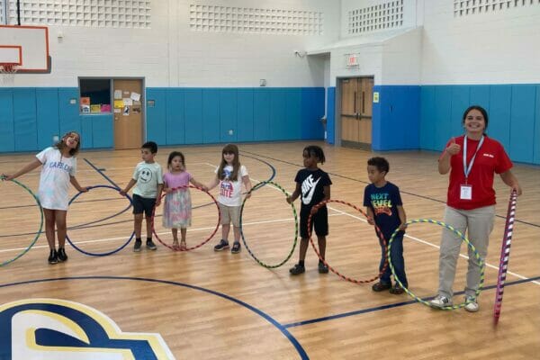 Julia and kids hula-hooping