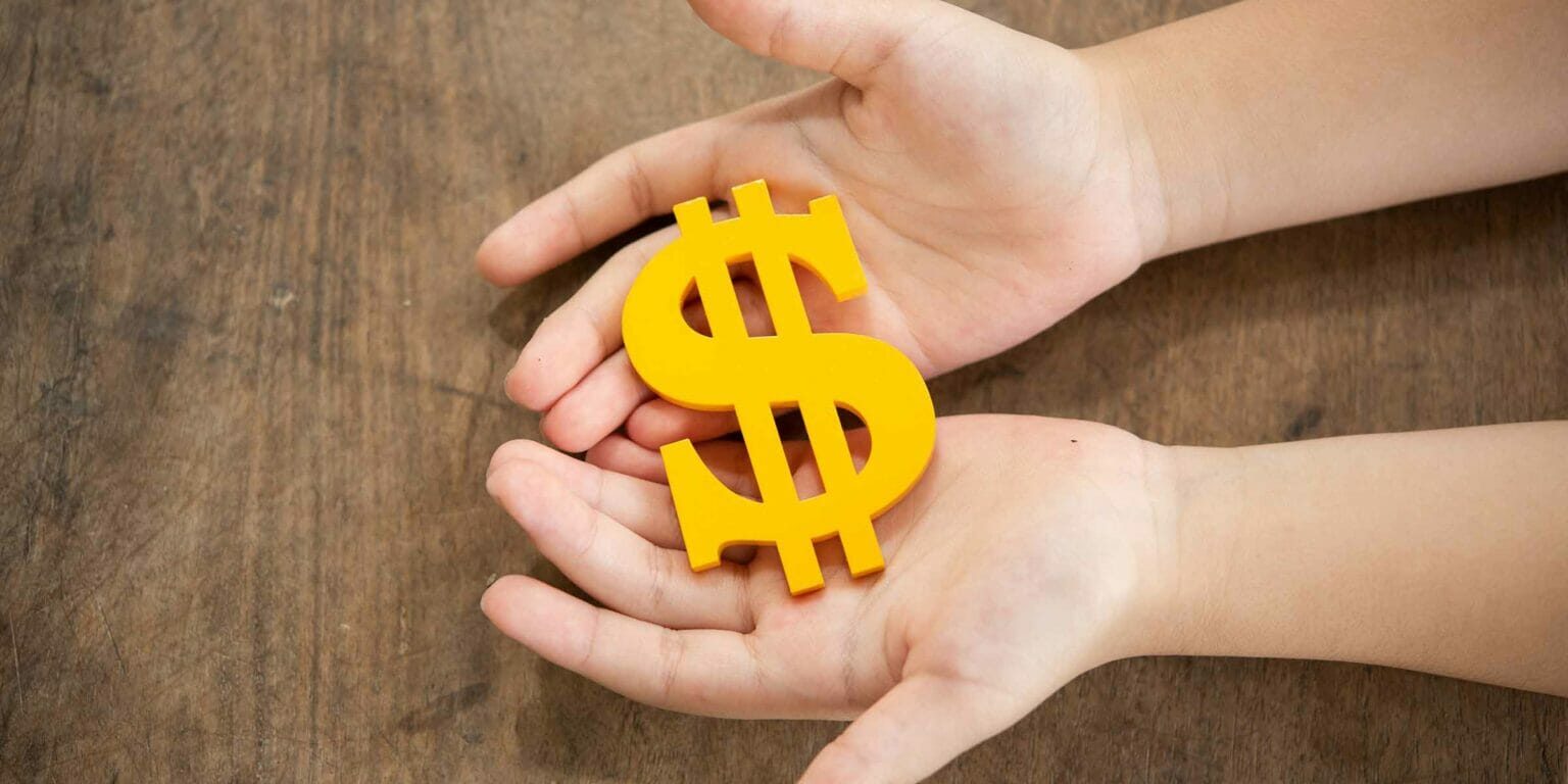 The yellow dollar symbol on hands children