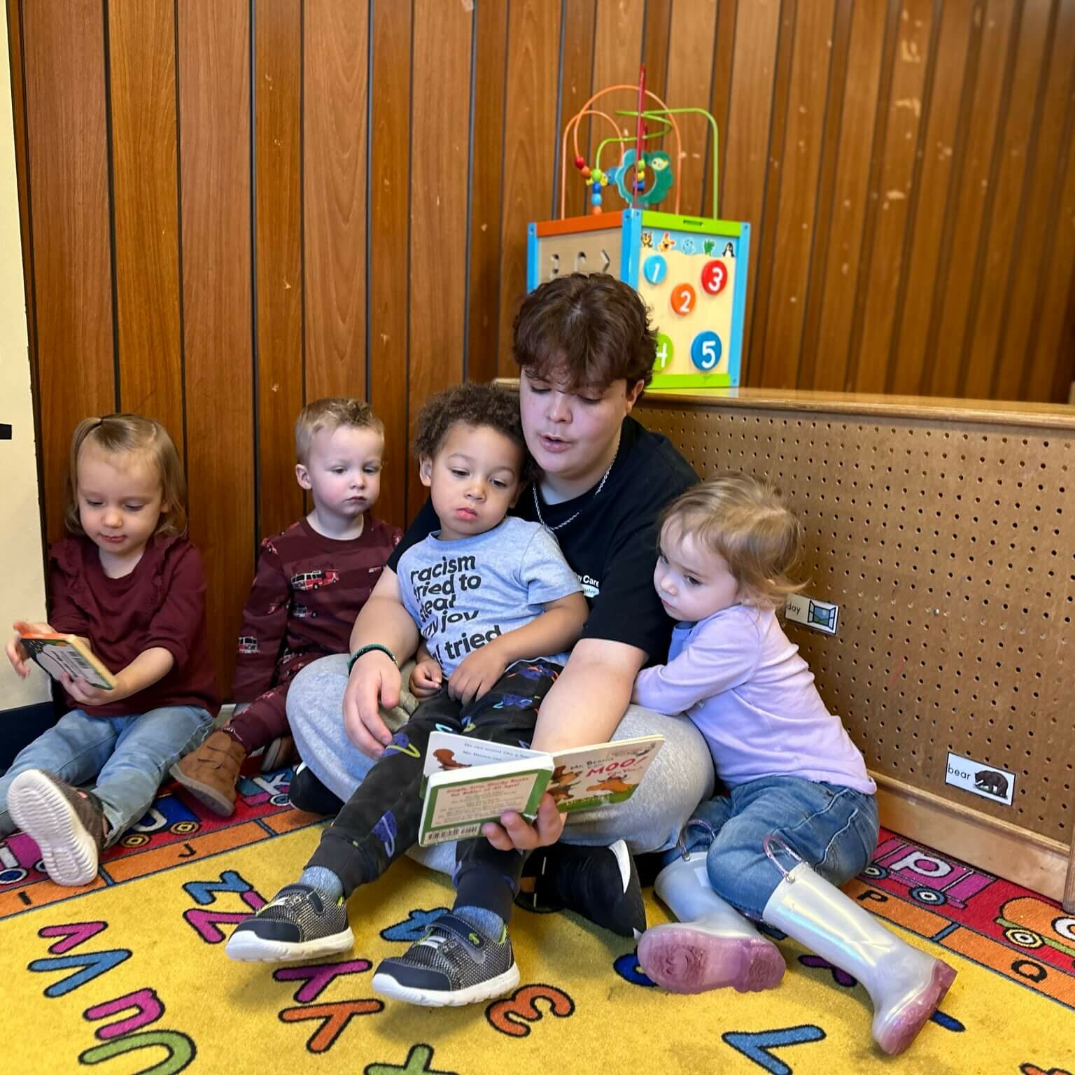 cumberland-toddler-teacher-reading-books